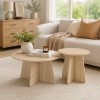 Retro-style Nesting Coffee Table Set. Available In Walnut Or Natural Wood Finishes. Round Nesting Side Tables With Crisscross Legs. Ideal For Living Rooms And Dining Rooms.